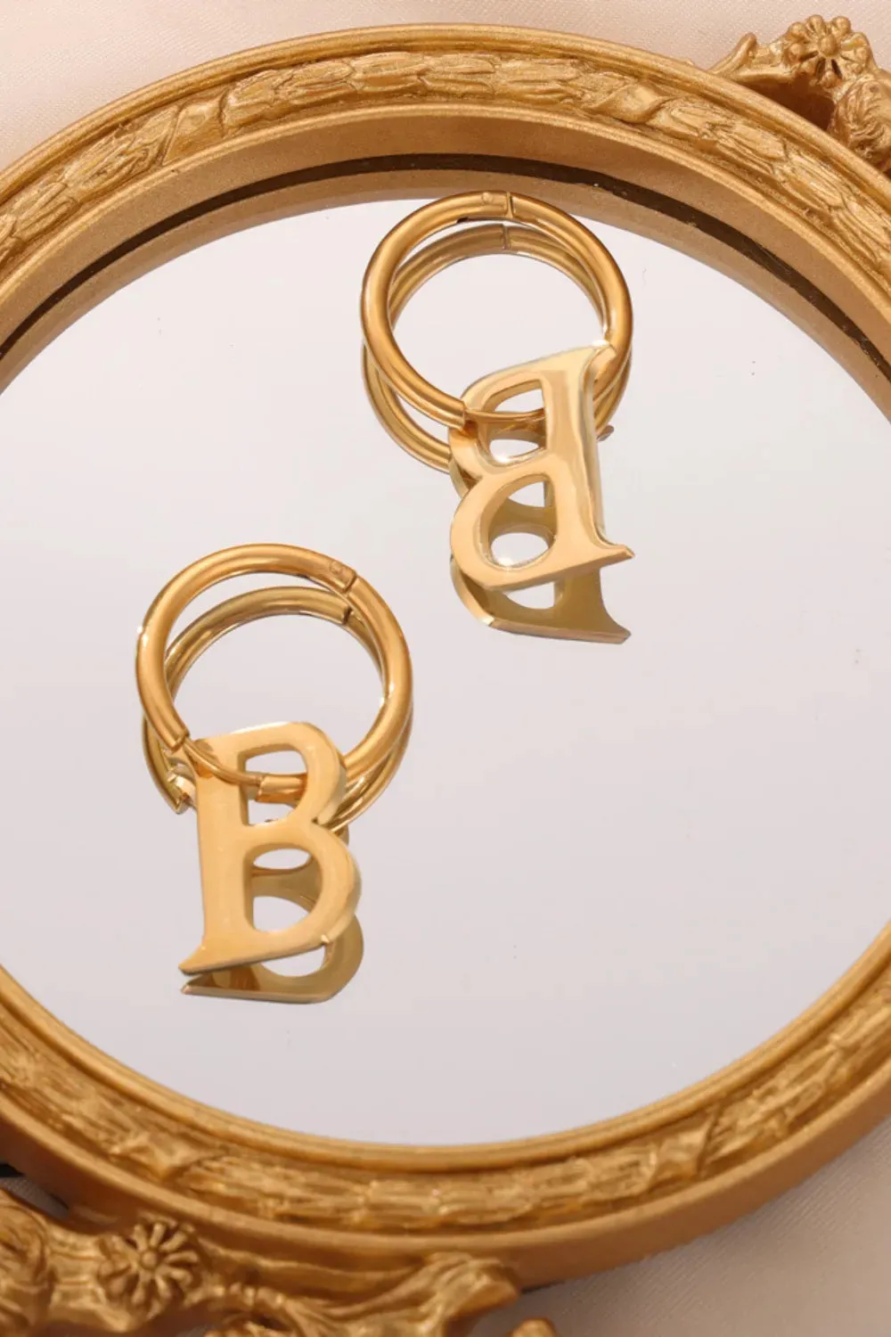 Titanium Steel Letter Hoop Earrings sold by Gigi Laurent product image thumbnail 4