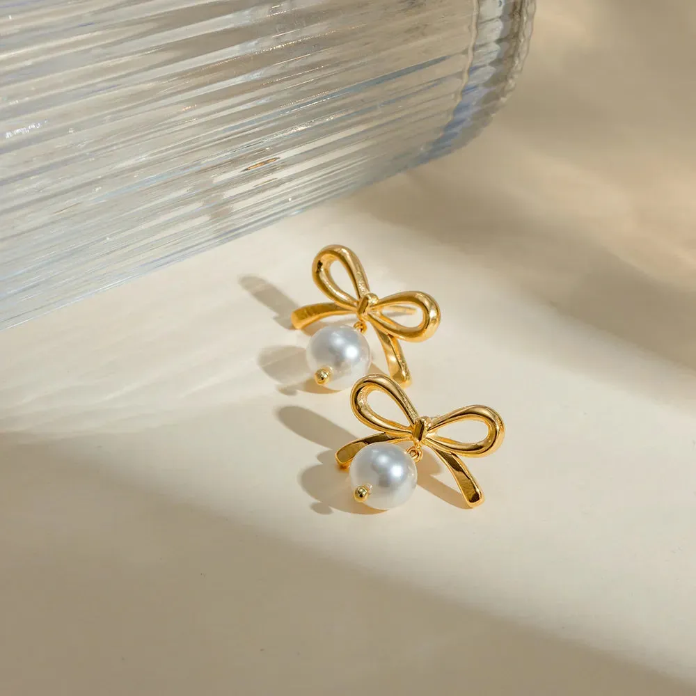 Stainless Steel Bow Pearl Earrings sold by Gigi Laurent product image thumbnail 3