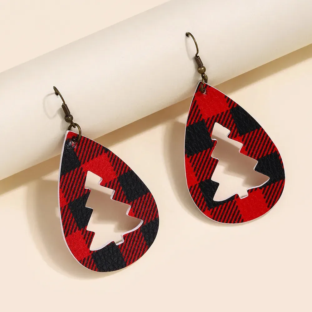 PU Leather Cutout Christmas Tree Earrings sold by Gigi Laurent