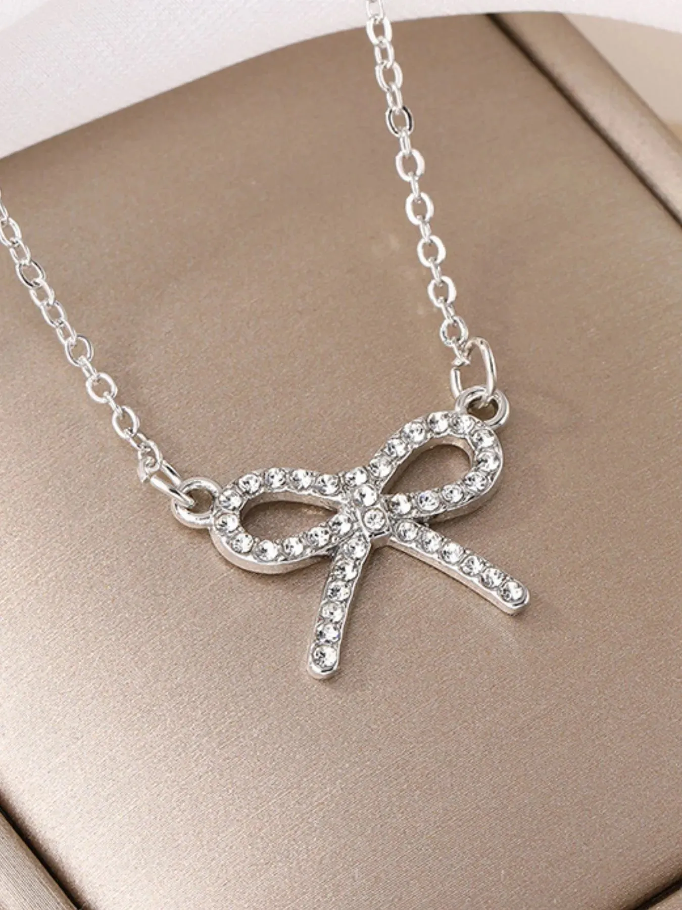 Zircon Bow Pendant Necklace sold by Gigi Laurent product image thumbnail 4