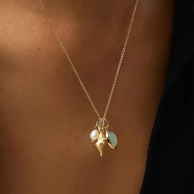 14K Gold-Plated Natural Crystal Conch Pendant Necklace sold by Gigi Laurent