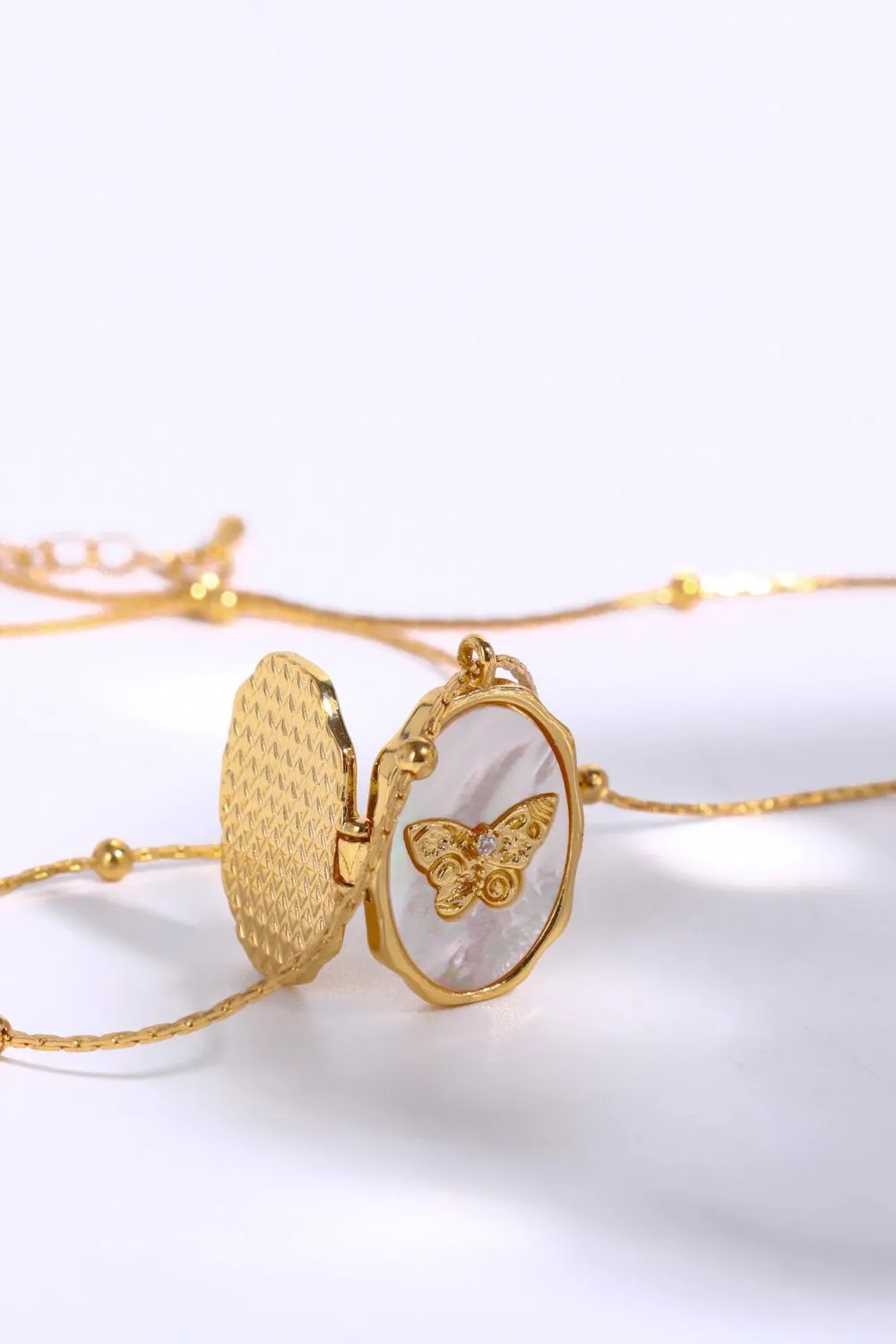 Butterfly Shell Pendant Copper Necklace sold by Gigi Laurent product image thumbnail 2