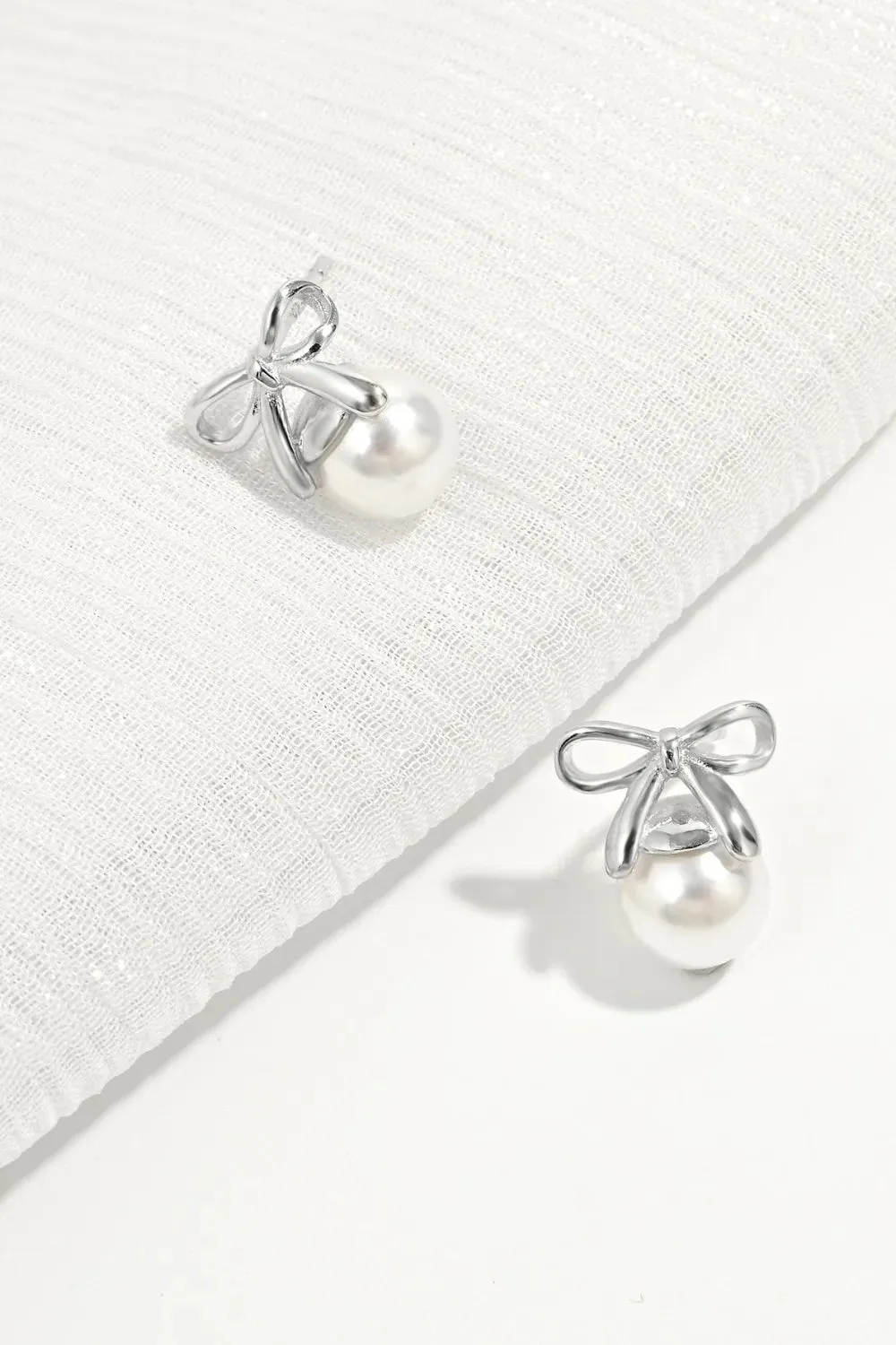 925 Sterling Silver Pearl Bow Earrings sold by Gigi Laurent product image thumbnail 3