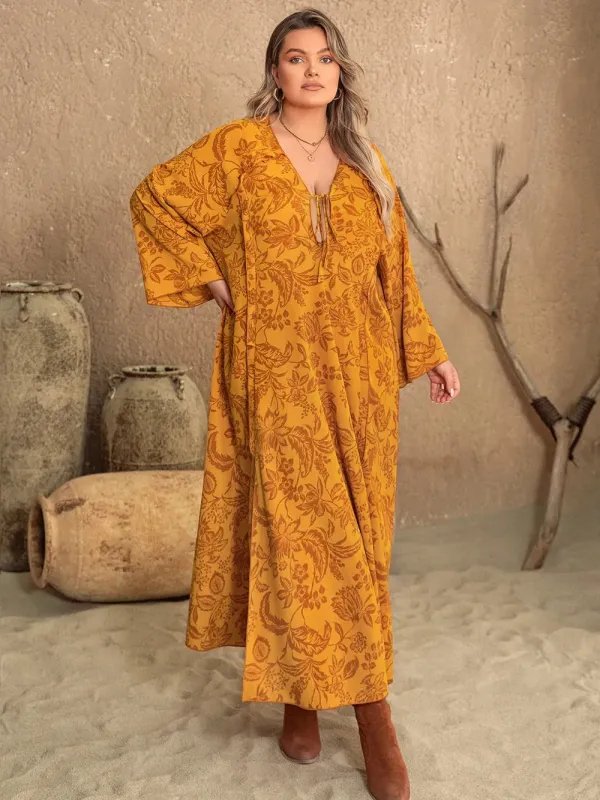 Plus Size Printed Slit Long Sleeve Dress sold by Gigi Laurent