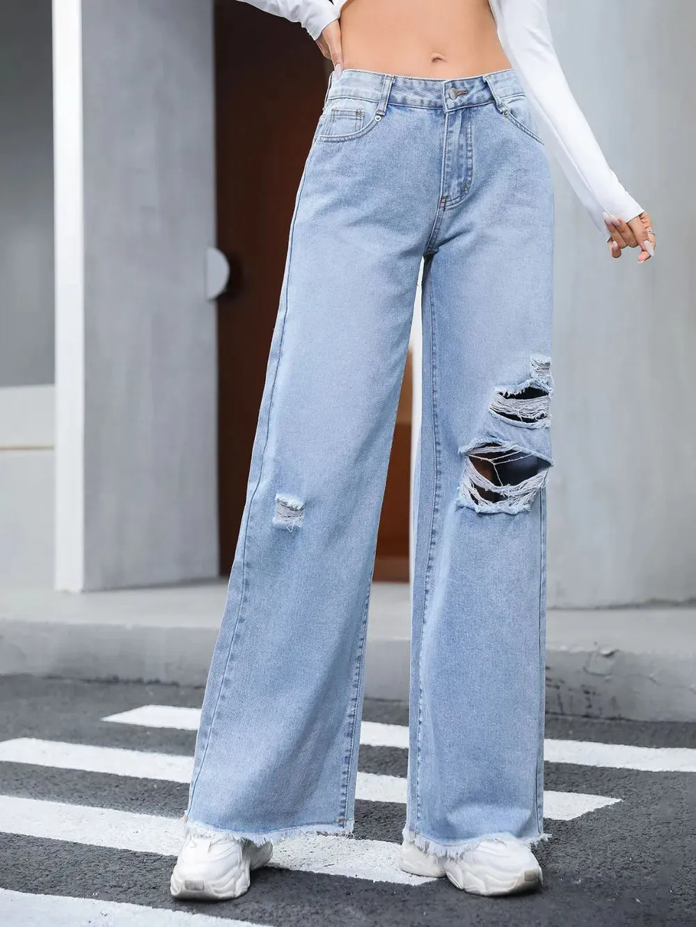 Distressed Raw Hem Wide Leg Jeans sold by Gigi Laurent