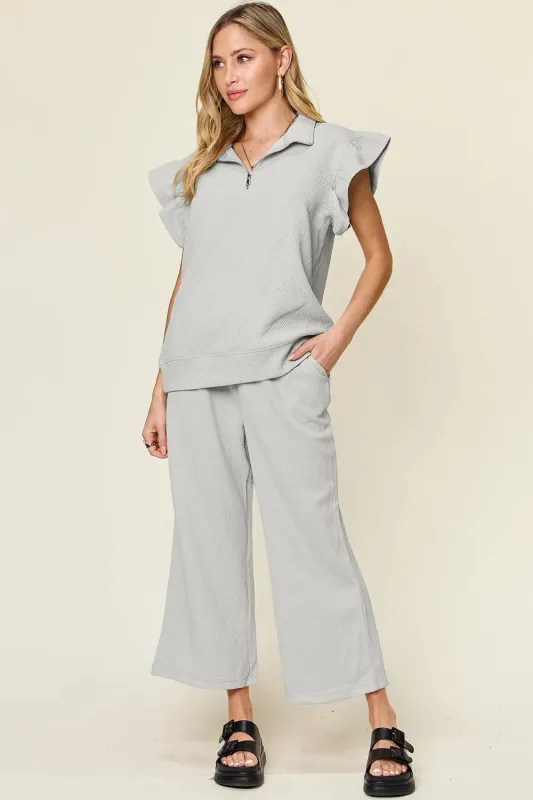 Double Take Texture Ruffle Short Sleeve Top and Drawstring Wide Leg Pants Set sold by Gigi Laurent