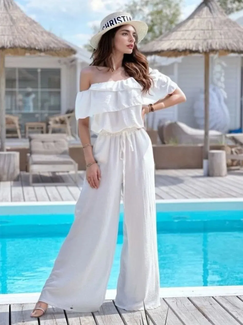 Ruffled Off Shoulder Wide Leg Jumpsuit sold by Gigi Laurent