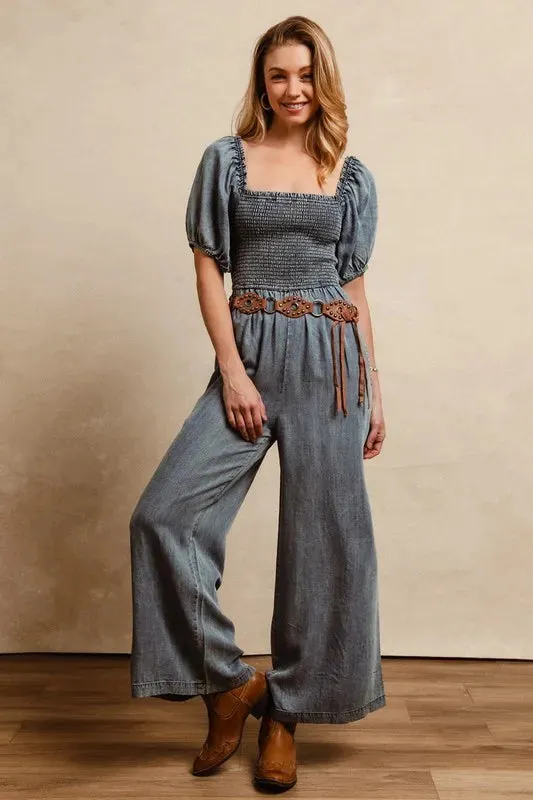 BiBi Smocked Washed Puff Sleeve Square Neck Denim Jumpsuit sold by Gigi Laurent