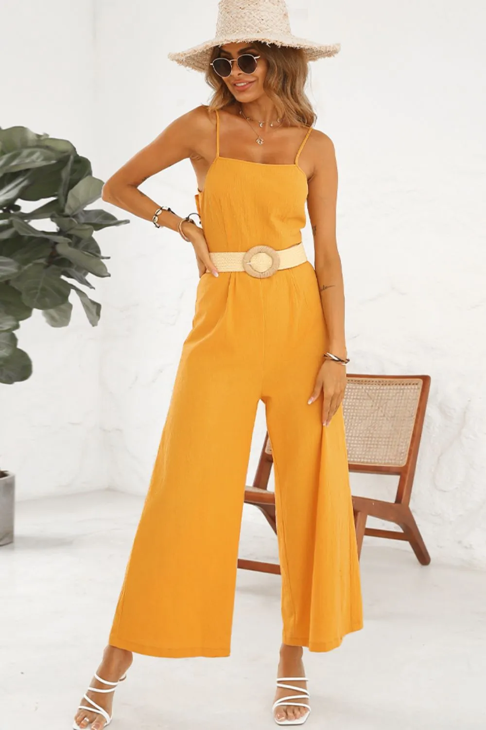 Shiny Cutout Spaghetti Strap Tie Back Wide Leg Jumpsuit sold by Gigi Laurent