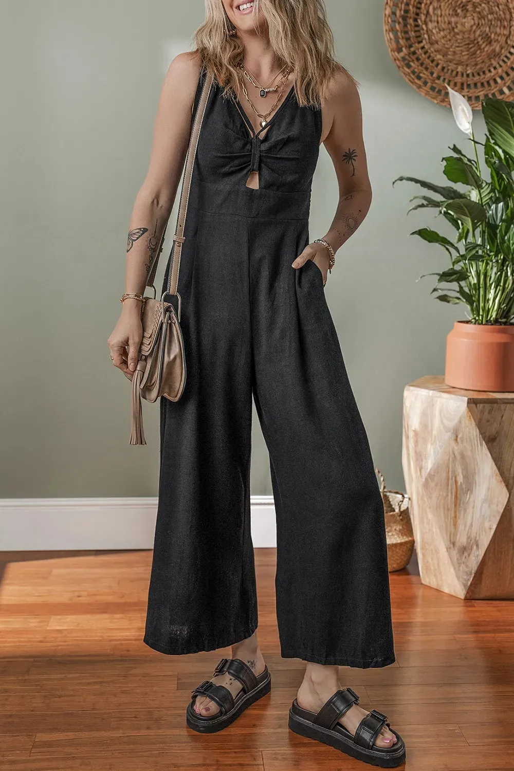 Front Cut Out Smocked Back Sleeveless Wide Leg Jumpsuit sold by Gigi Laurent