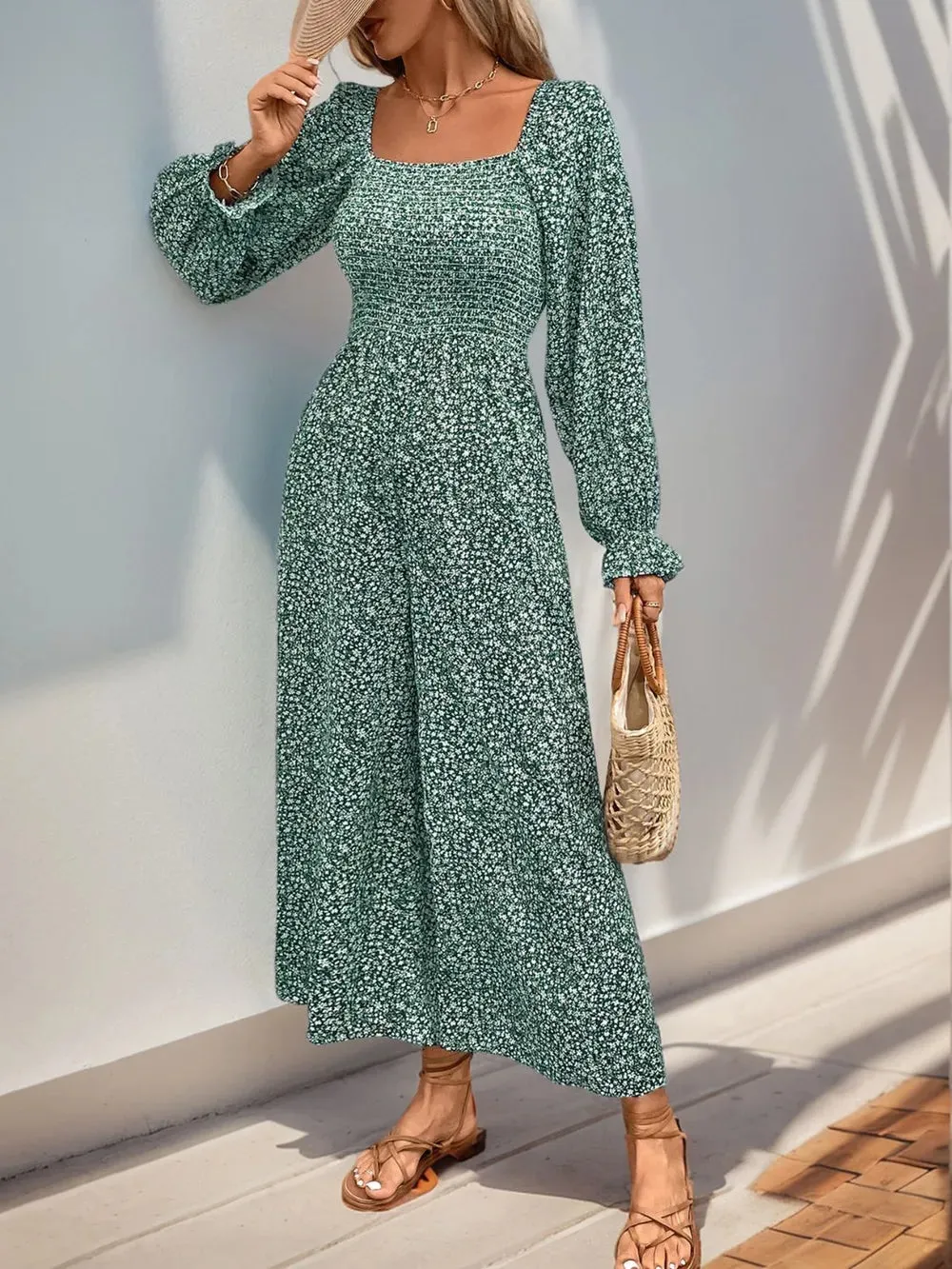 Perfee Smocked Printed Long Sleeve Wide Leg Jumpsuit sold by Gigi Laurent