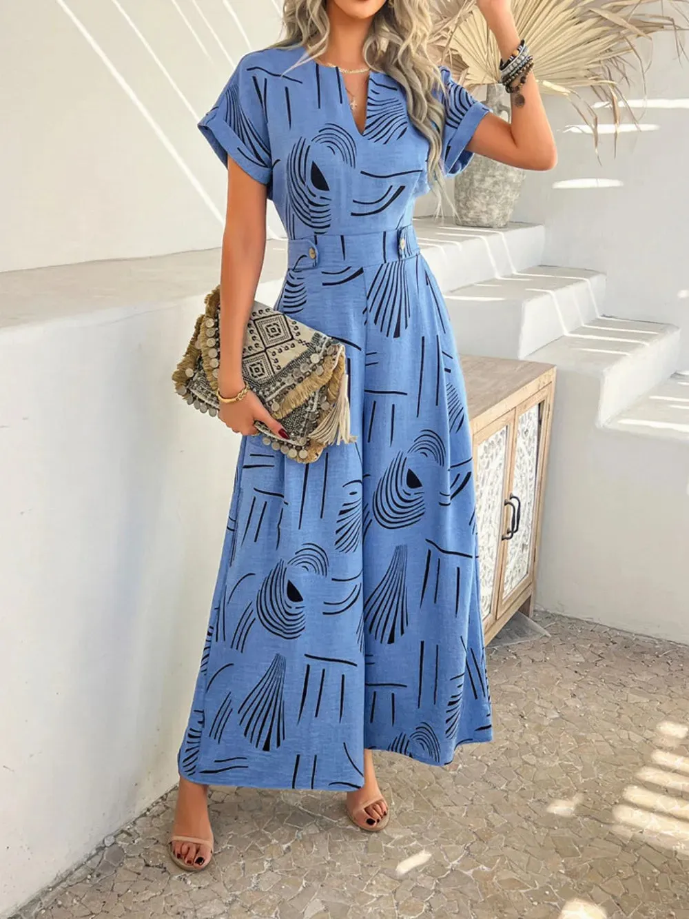 Devine Printed Notched Short Sleeve Wide Leg Jumpsuit sold by Gigi Laurent product image thumbnail 3