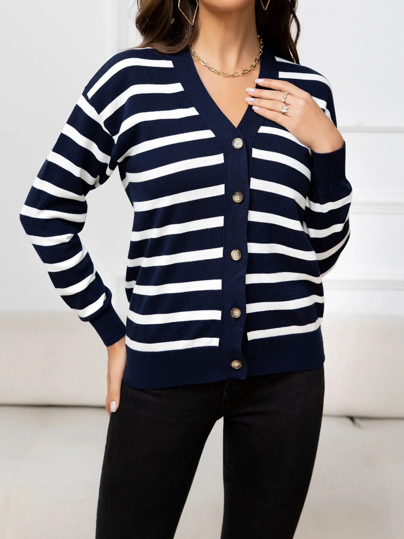 Striped Dropped Shoulder V-Neck Knit Top sold by Gigi Laurent