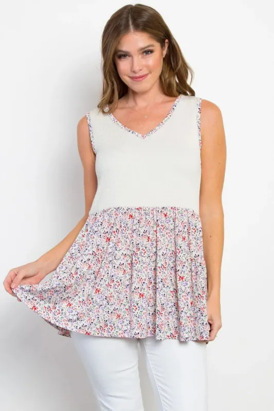 Be Stage Full Size Smocked Printed Peplum Sleeveless Top sold by Gigi Laurent