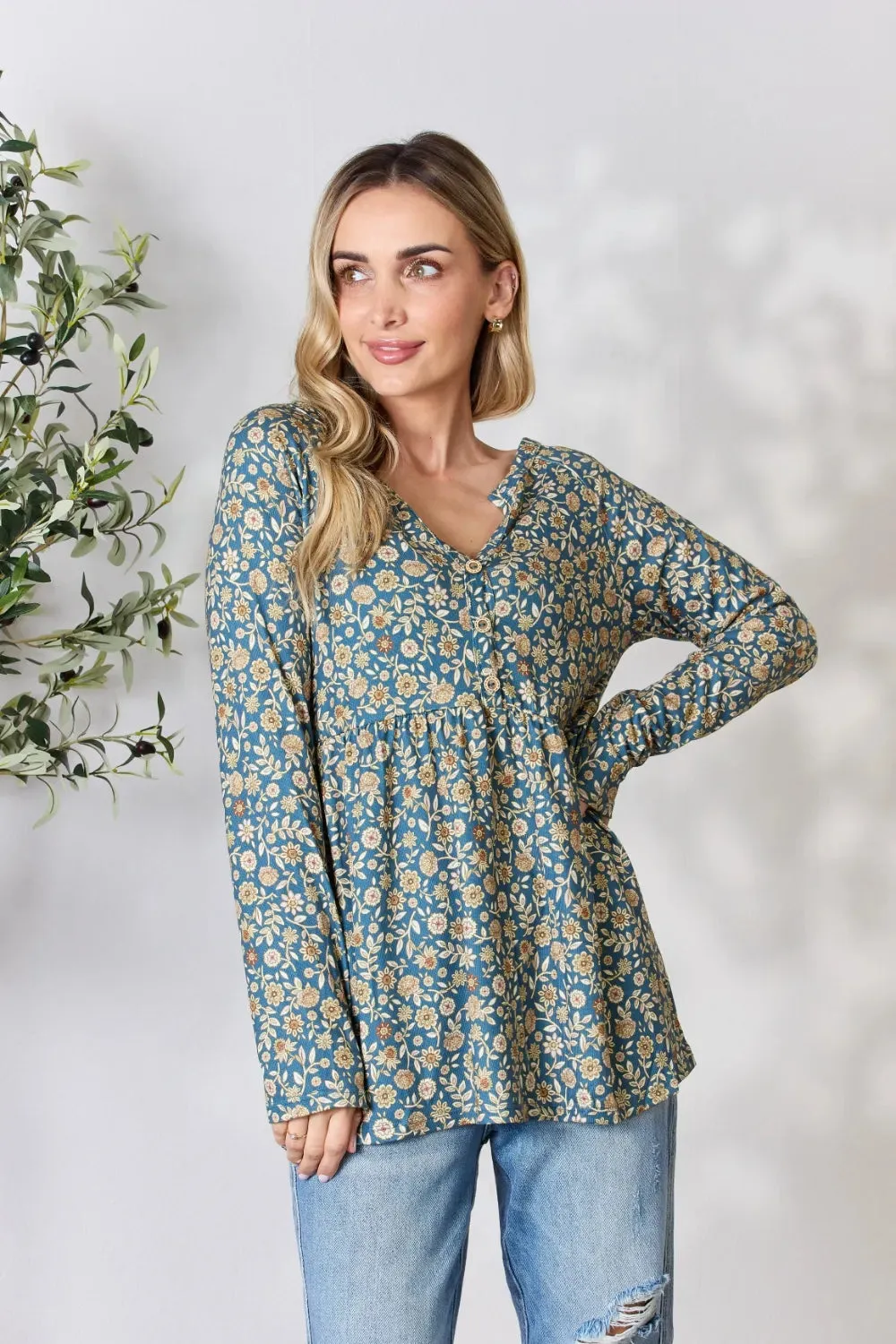 Heimish Full Size Floral Half Button Long Sleeve Blouse sold by Gigi Laurent