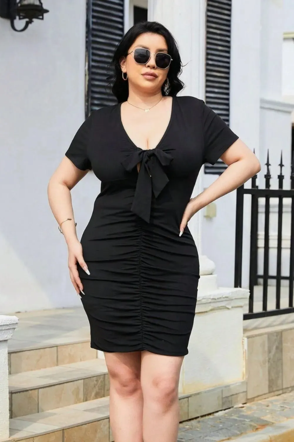 Plus Size Ruched Tied Short Sleeve Mini Dress sold by Gigi Laurent