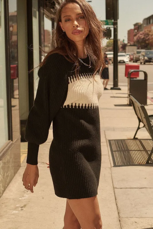 A Ribbed Knit Sweater Mini Dress sold by Gigi Laurent