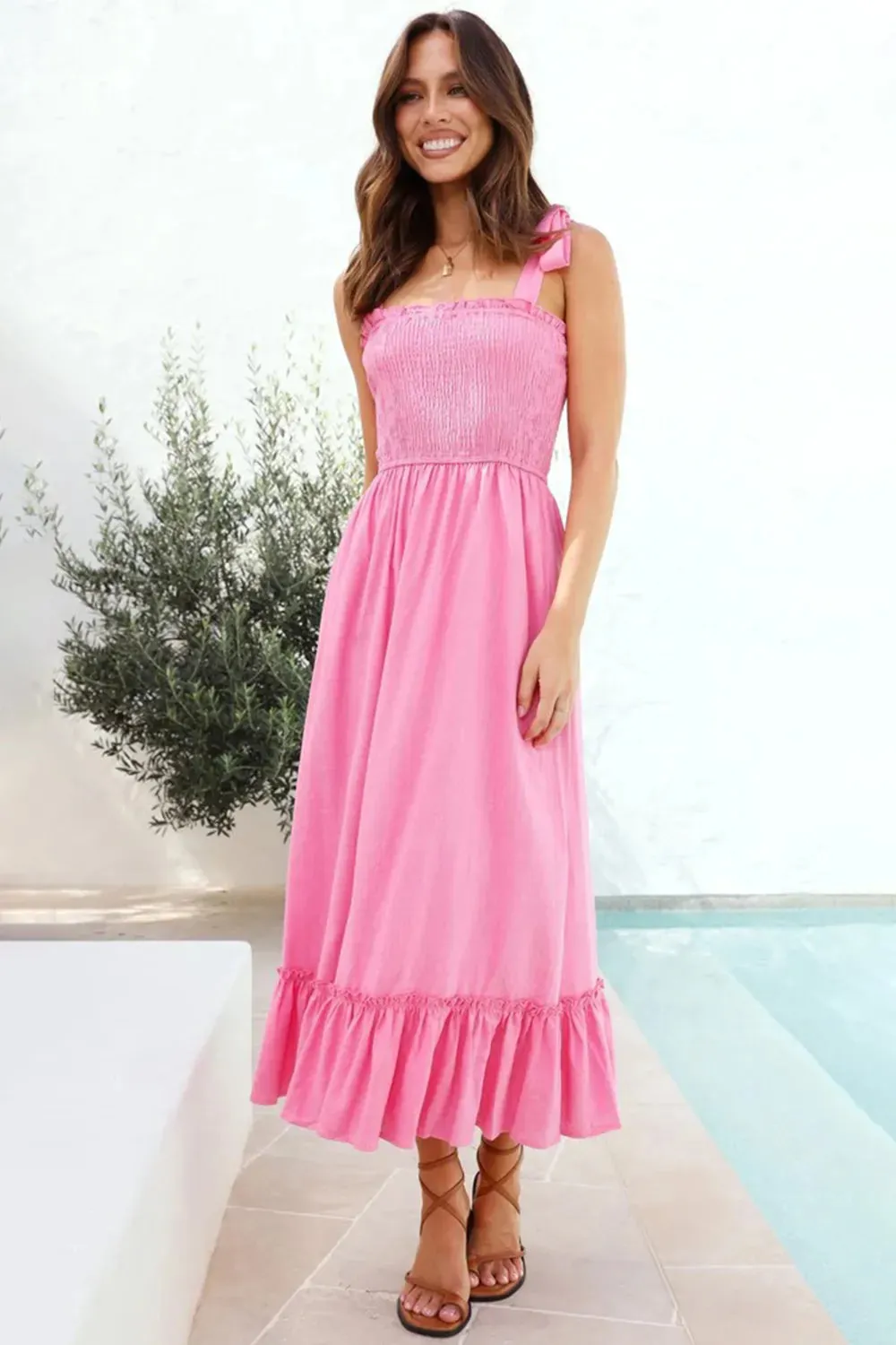 Ruffled Smocked Ruffle Hem Sleeveless Dress sold by Gigi Laurent