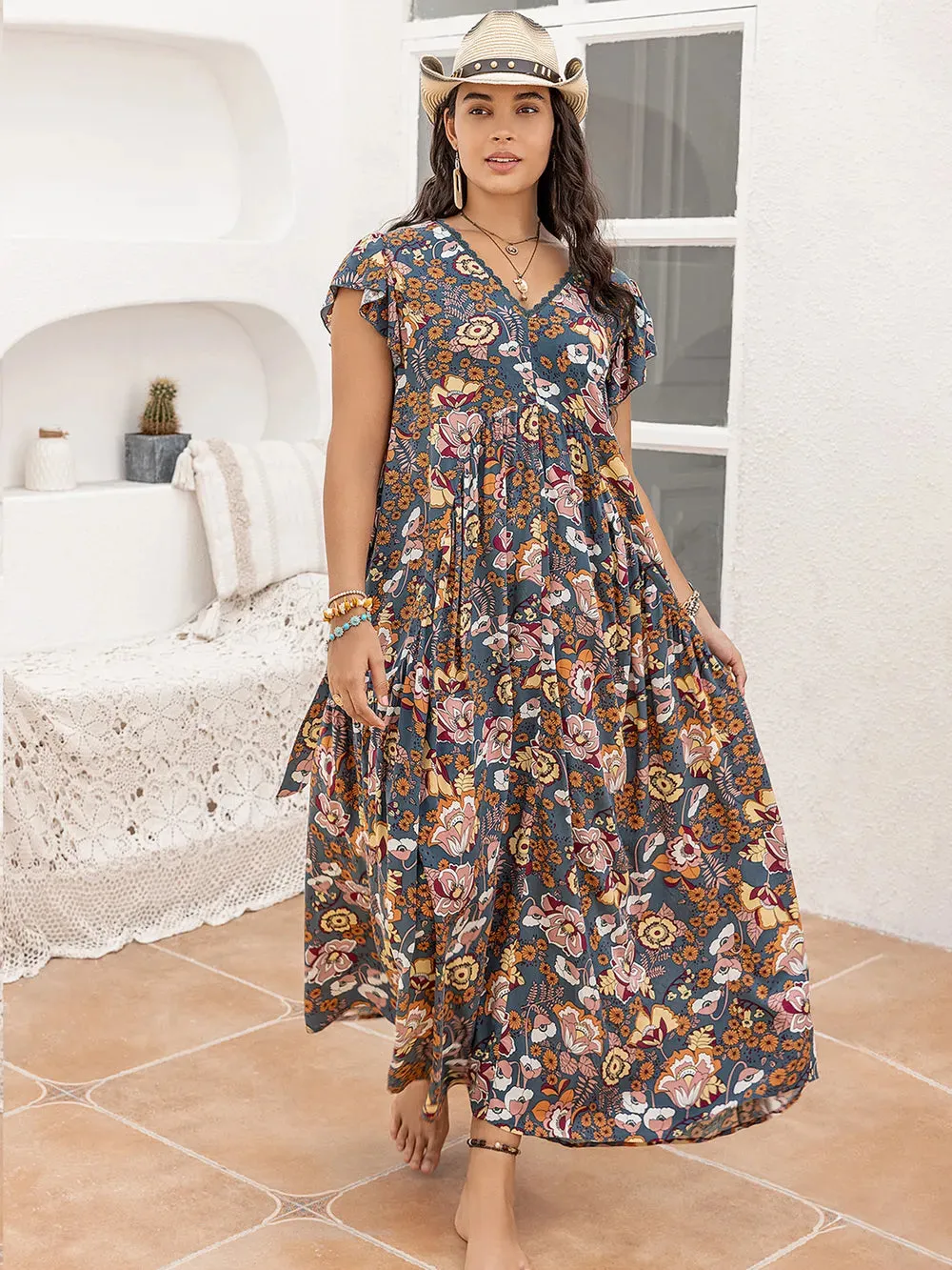 Plus Size Ruffled Printed Cap Sleeve Dress sold by Gigi Laurent