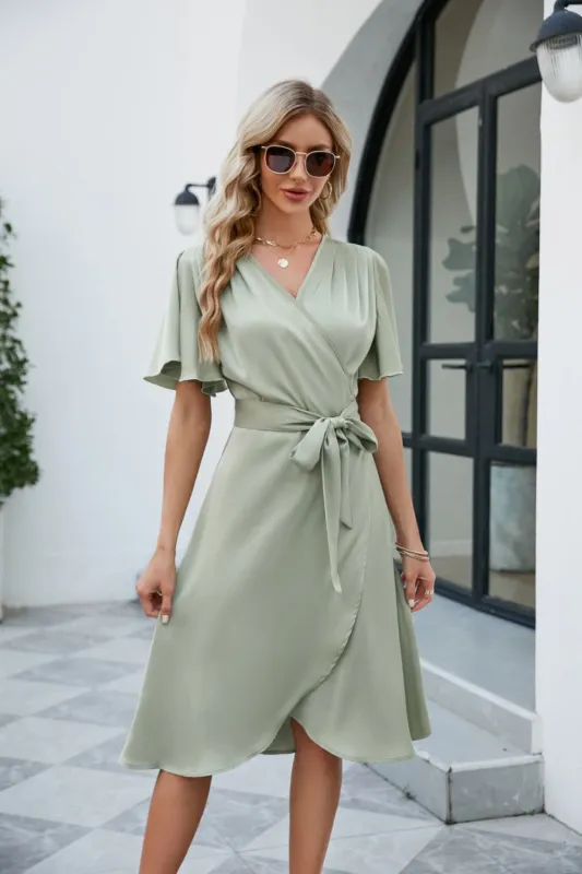 Tie Waist Flutter Sleeve Surplice Dress sold by Gigi Laurent