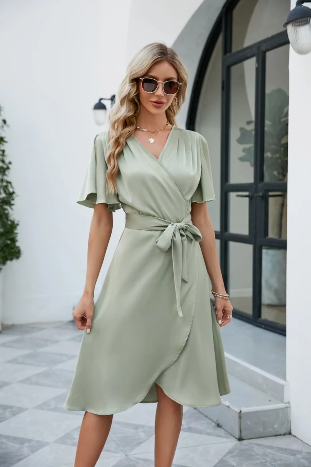 Tie Waist Flutter Sleeve Surplice Dress sold by Gigi Laurent