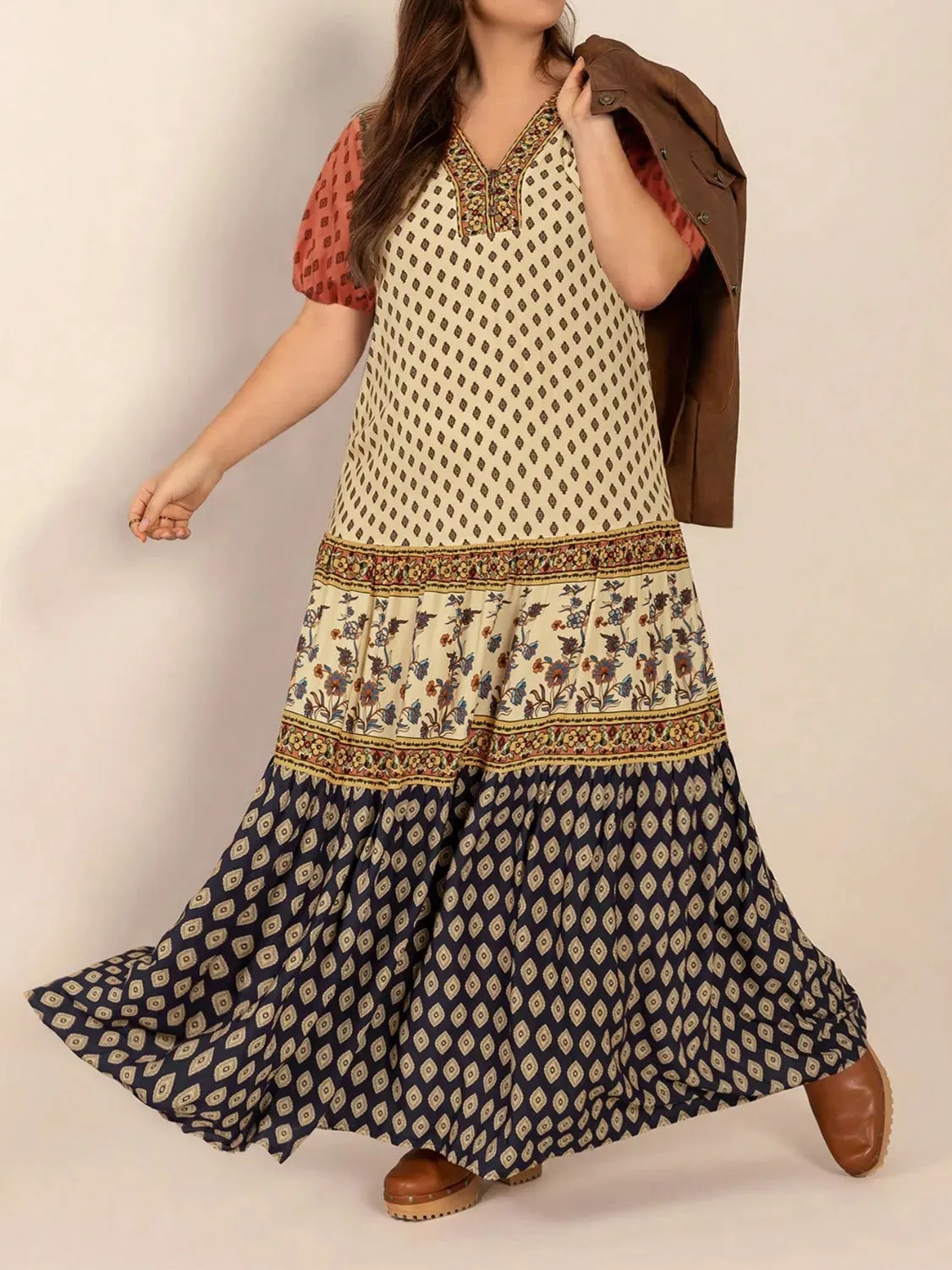 Plus Size Ruched Printed Short Sleeve Midi Dress sold by Gigi Laurent
