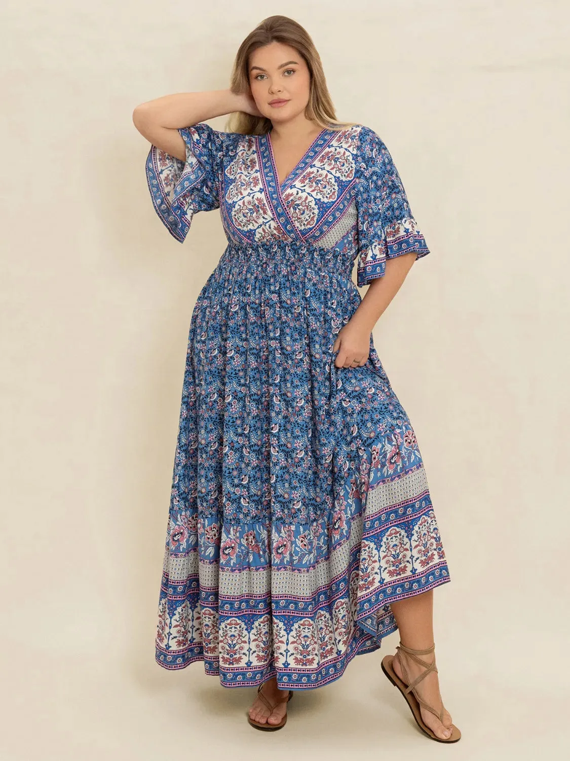 Plus Size Printed Surplice Half Sleeve Dress sold by Gigi Laurent