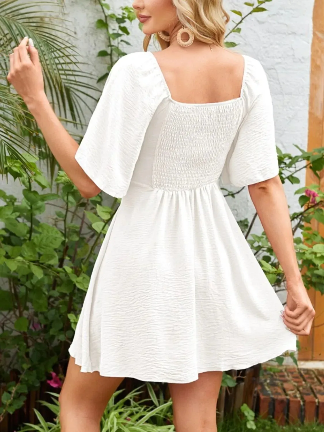 Smocked Back Knotted Flutter Sleeve Dress sold by Gigi Laurent product image thumbnail 2