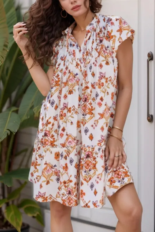 Printed Tie Neck Cap Sleeve Mini Dress sold by Gigi Laurent