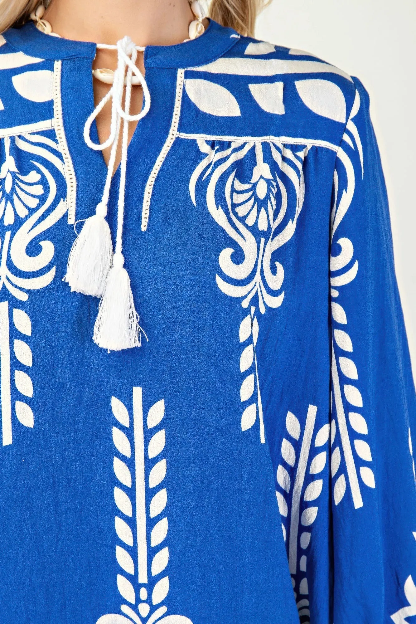 Printed 3/4 Sleeve Dress With Tassel Tie And Fringe Detail On Hem sold by Gigi Laurent product image thumbnail 4
