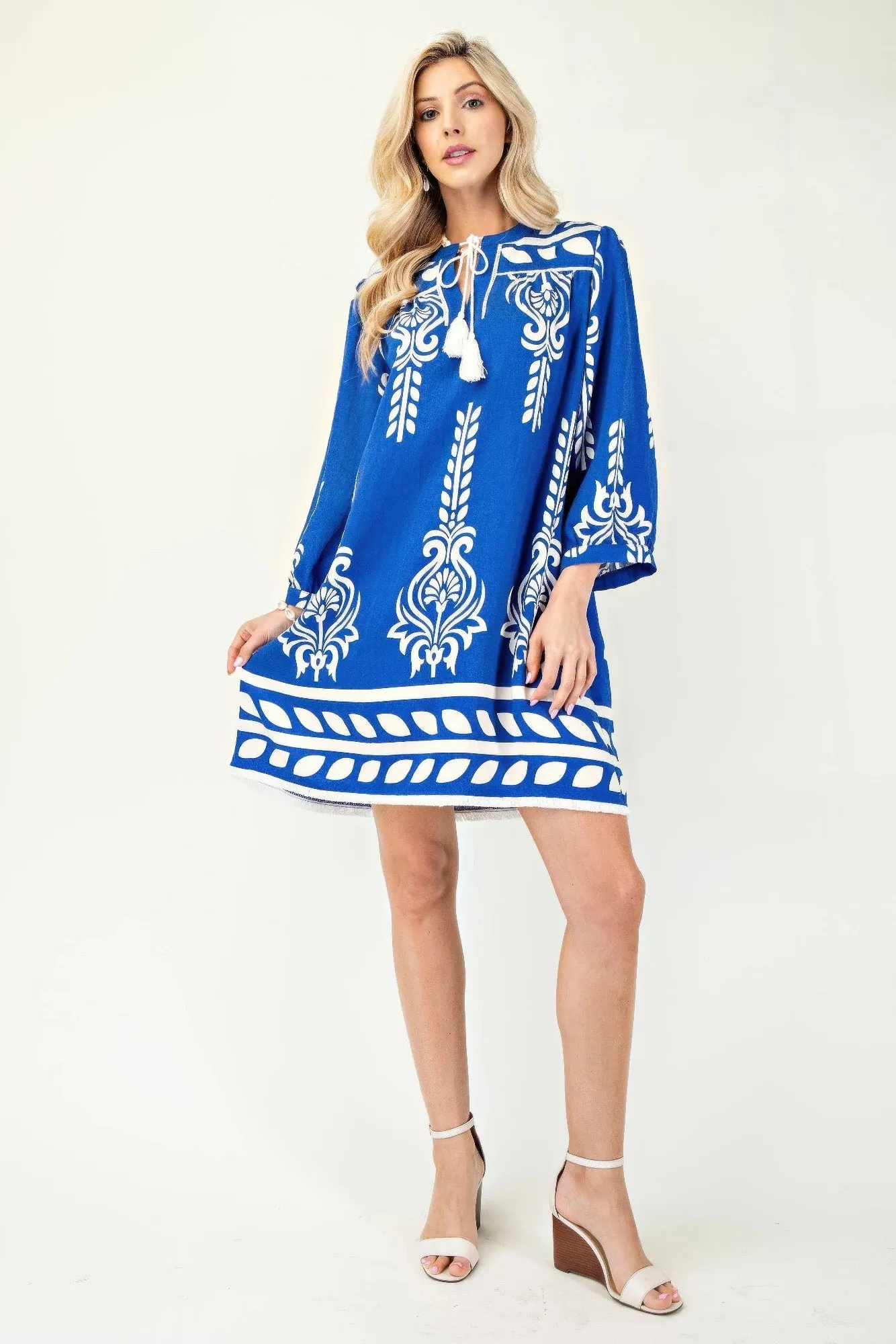 Printed 3/4 Sleeve Dress With Tassel Tie And Fringe Detail On Hem sold by Gigi Laurent product image thumbnail 2
