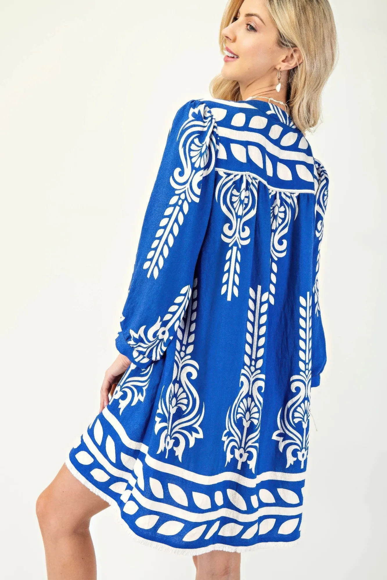 Printed 3/4 Sleeve Dress With Tassel Tie And Fringe Detail On Hem sold by Gigi Laurent product image thumbnail 5