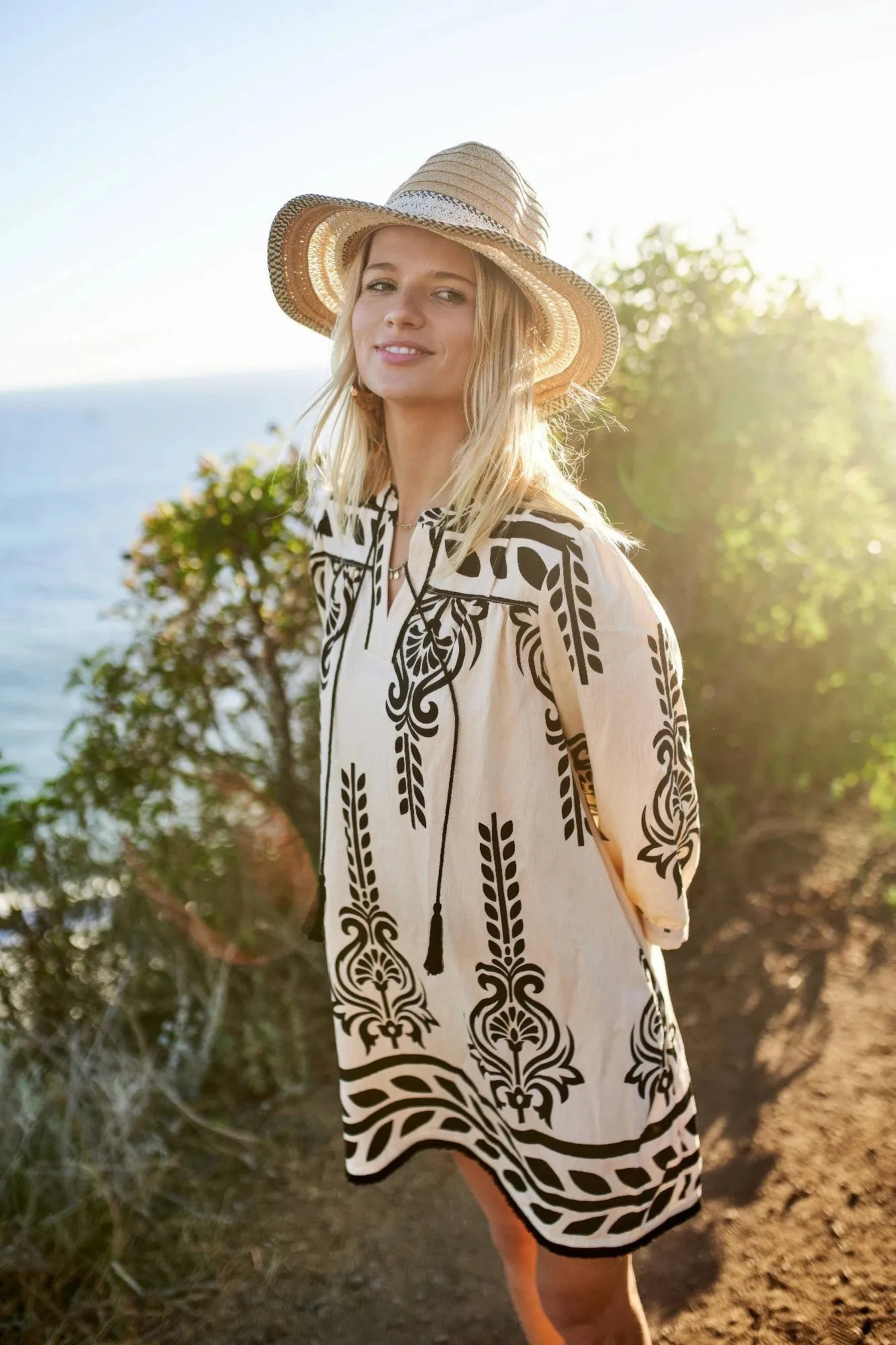 Printed 3/4 Sleeve Dress With Tassel Tie And Fringe Detail On Hem sold by Gigi Laurent product image thumbnail 3