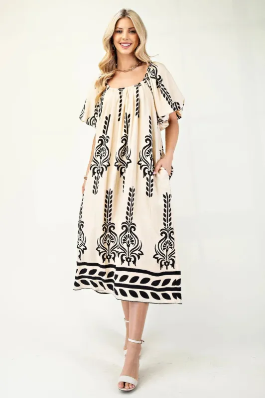 Printed Midi Dress With Short Puff Sleeves sold by Gigi Laurent