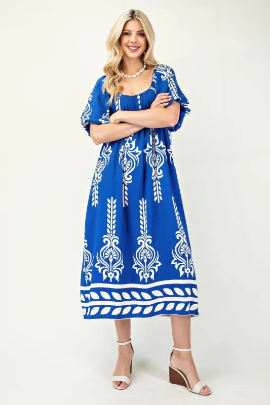 Printed Midi Dress With Short Puff Sleeves sold by Gigi Laurent