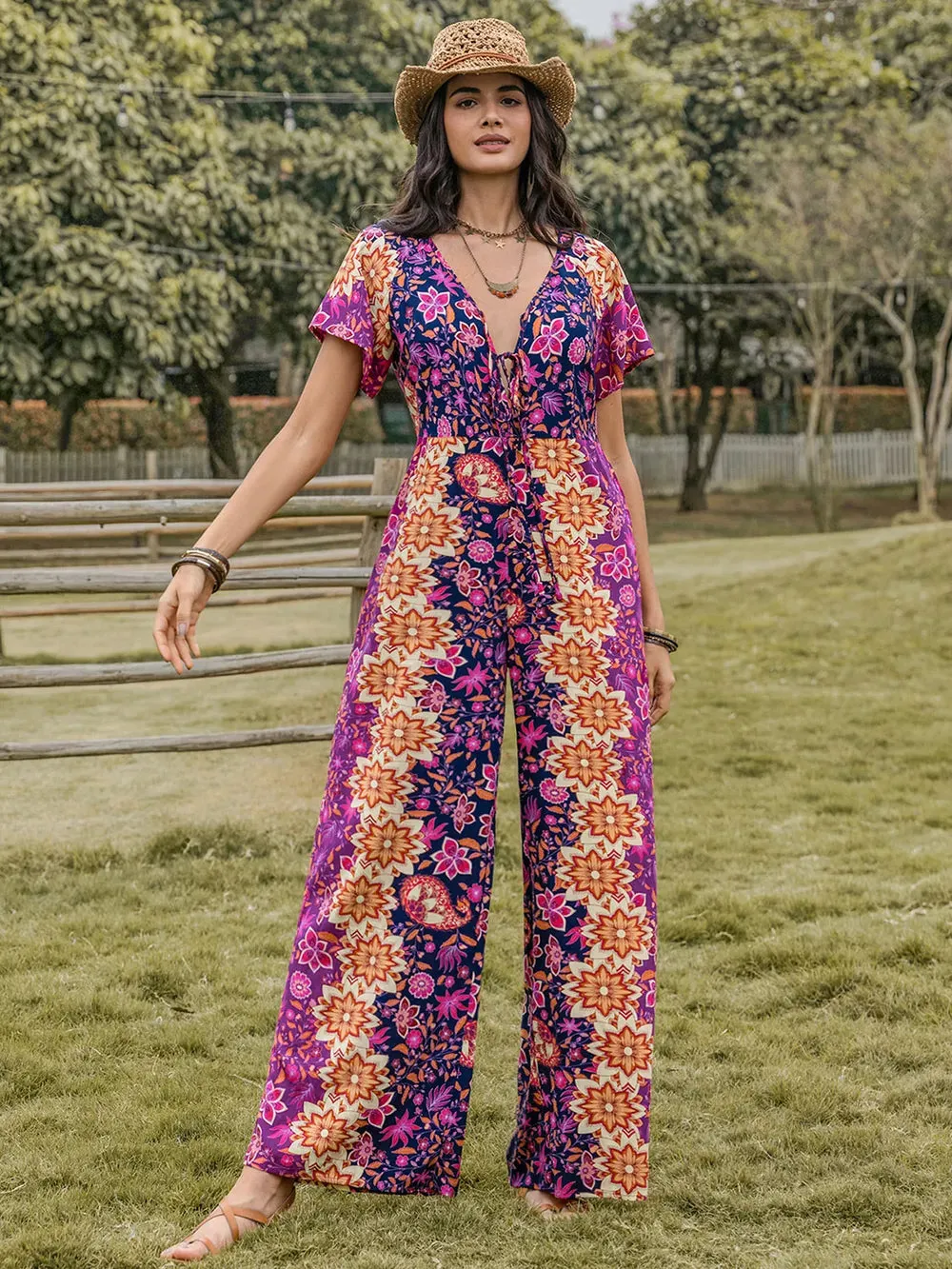 Tied V-Neck Short Sleeve Jumpsuit sold by Gigi Laurent