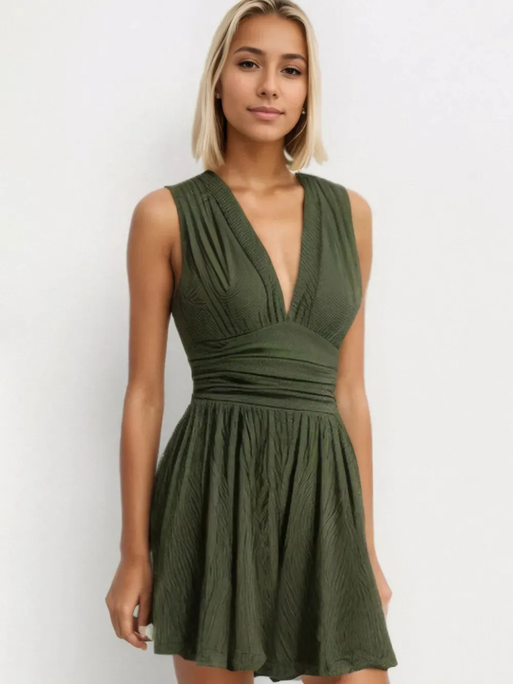 Ruched Plunge Sleeveless Romper sold by Gigi Laurent