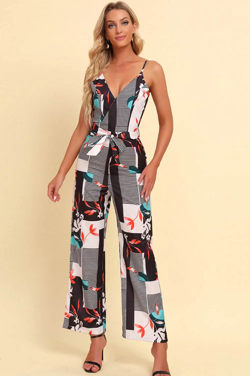Printed Spaghetti Strap Tied Jumpsuit sold by Gigi Laurent
