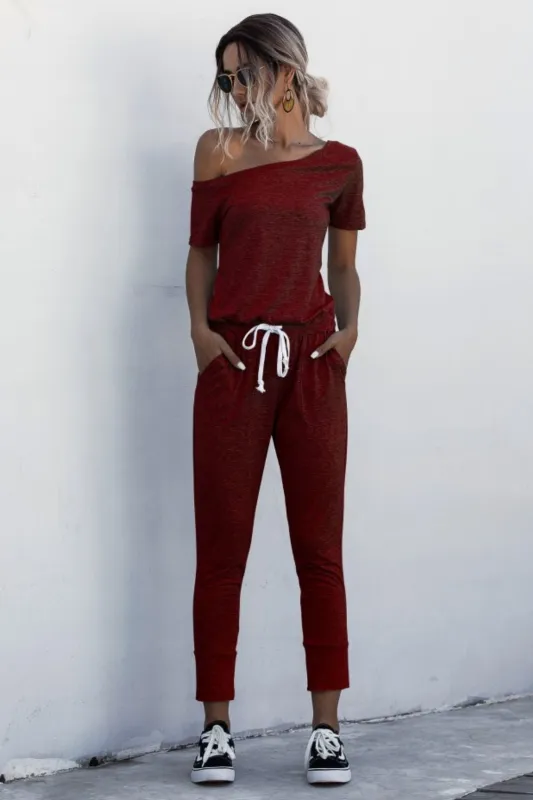 Asymmetrical Neck Tied Jumpsuit with Pockets sold by Gigi Laurent