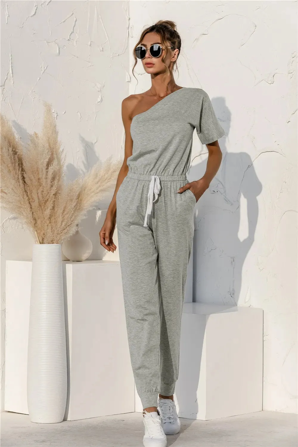 Single Shoulder Short Sleeve Jumpsuit sold by Gigi Laurent