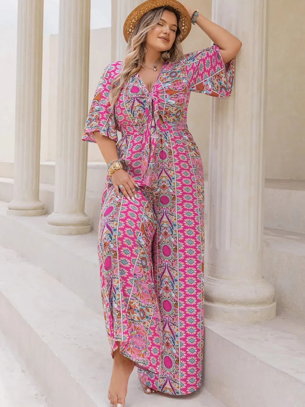 Plus Size Printed Half Sleeve Wide Leg Jumpsuit sold by Gigi Laurent