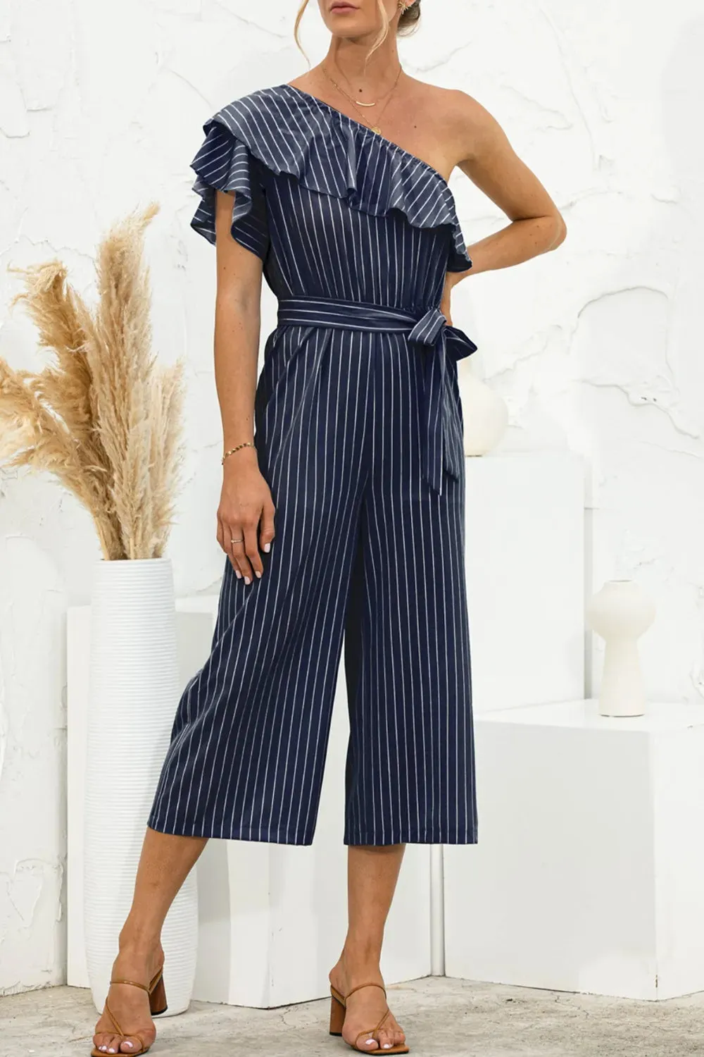 Ruffled Single Shoulder Tie Waist Jumpsuit sold by Gigi Laurent