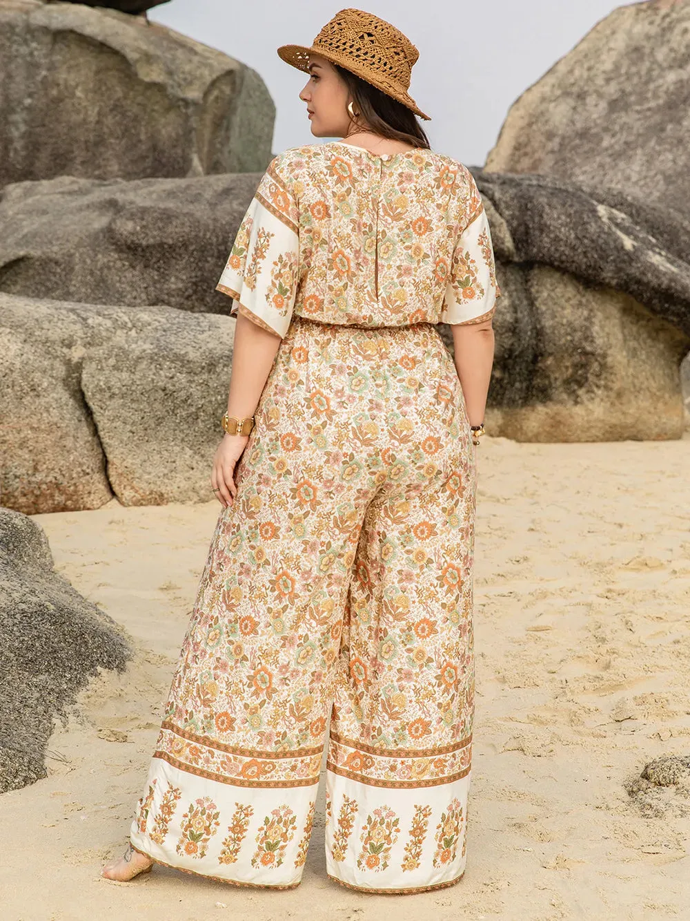 Plus Size V-Neck Flutter Sleeve Wide Leg Jumpsuit sold by Gigi Laurent product image thumbnail 2