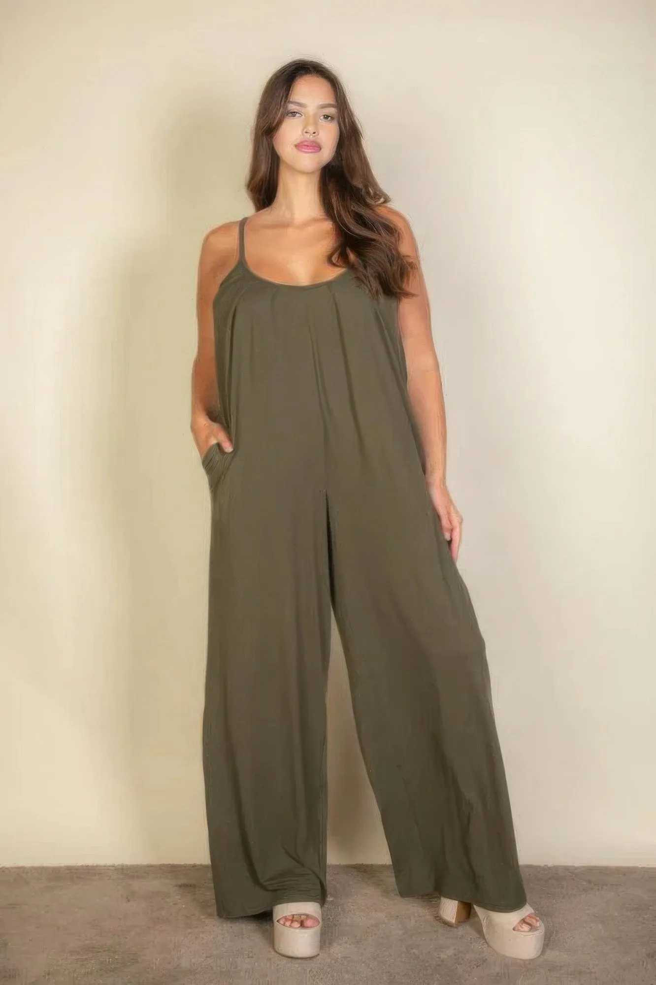 Plus spaghetti strap solid wide jumpsuit sold by Gigi Laurent