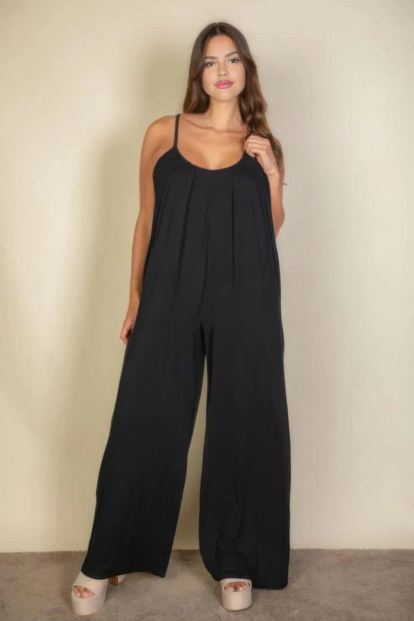 Plus spaghetti strap solid wide jumpsuit sold by Gigi Laurent