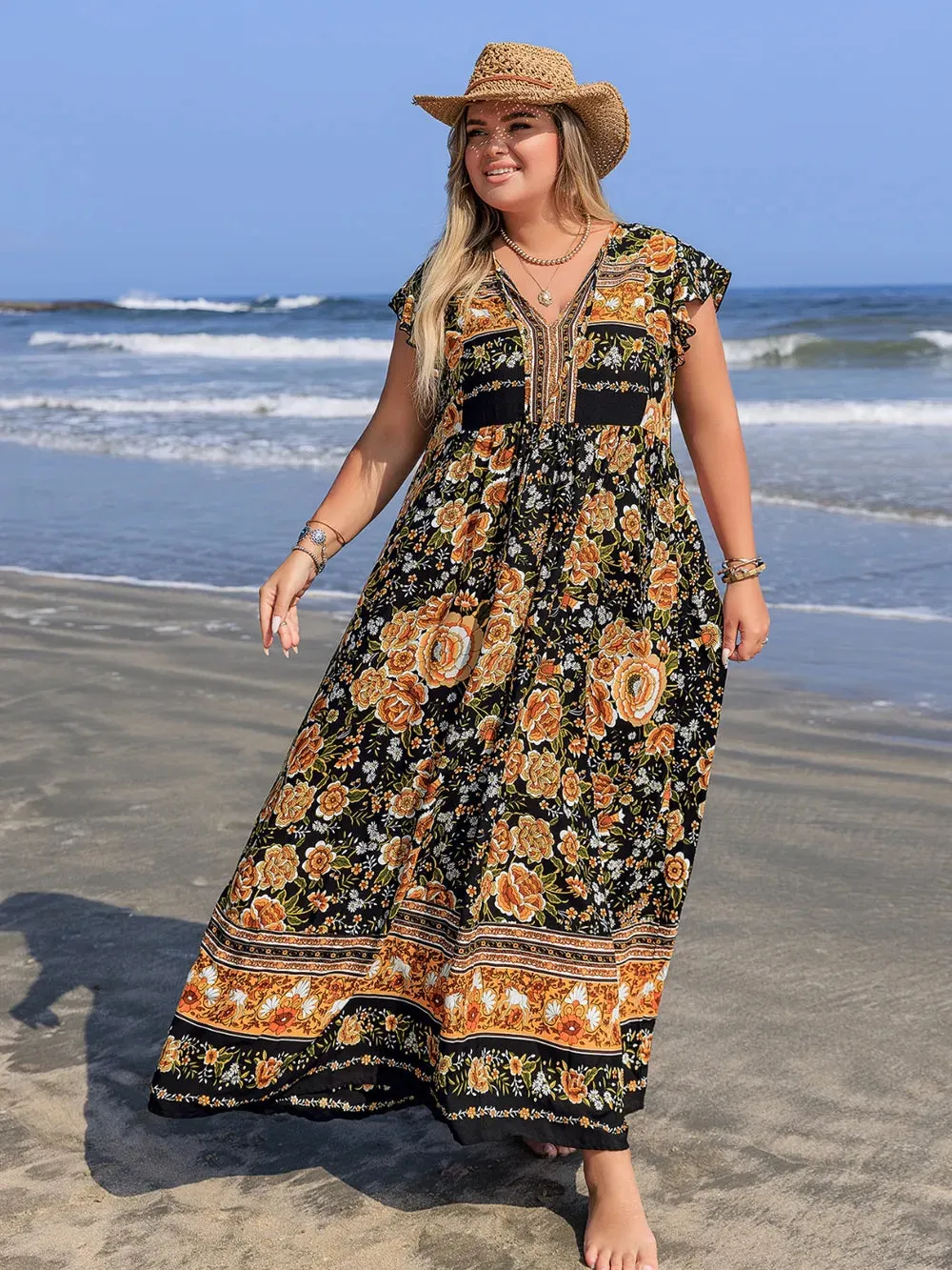 Plus Size Printed V-Neck Ruffle Cap Sleeve Maxi Dress sold by Gigi Laurent