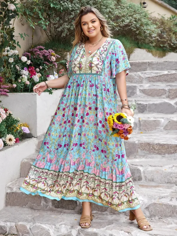 Plus Size Printed Tie Neck Flutter Sleeve Maxi Dress sold by Gigi Laurent