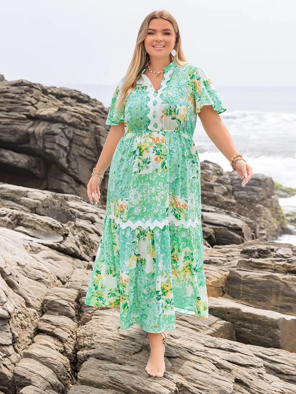 Plus Size Printed Notched Short Sleeve Maxi Dress sold by Gigi Laurent product image thumbnail 2
