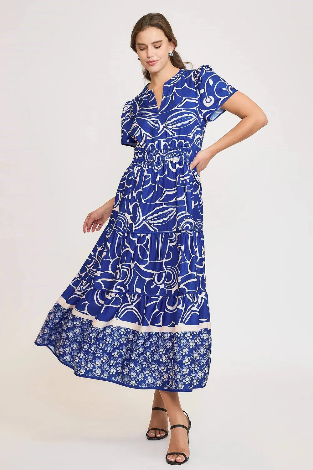 Umgee Full Size Printed Notched Short Sleeve Tiered Dress Plus Size sold by Gigi Laurent