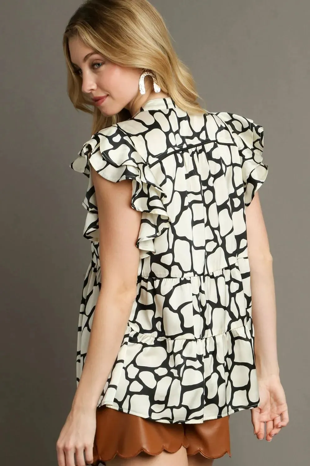 Umgee Full Size Two Tone Animal Print Notched Ruffle Cap Sleeve Blouse Plus Size sold by Gigi Laurent product image thumbnail 2